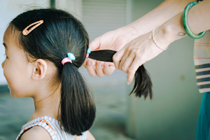 Young girl with hair in plaits Young girl with hair in plaits